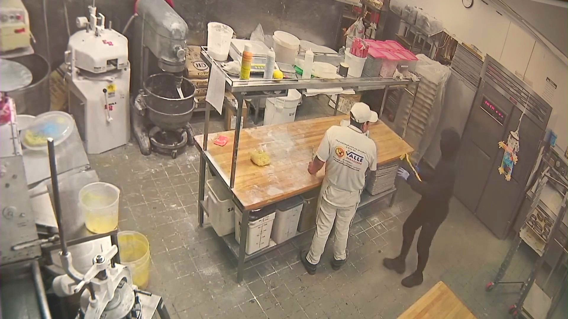 Video captures the terrifying moment a group of masked suspects ransacked a Pico-Union bakery as workers were still inside on Jan. 15, 2024. (El Valle Oaxaqueño)